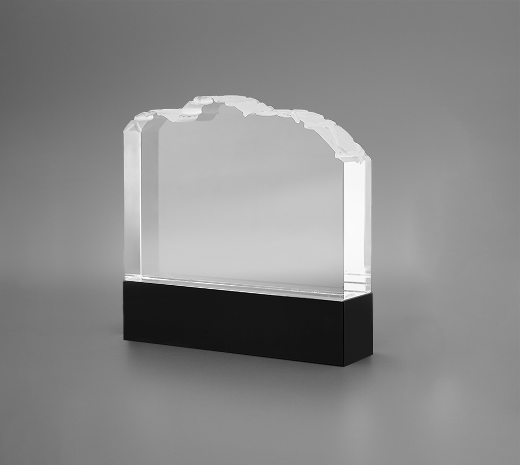 Engravia is a clear crystal trophies in the shape of cloud silhouettes are commonly used for awards and recognition events, offering a unique and elegant design.