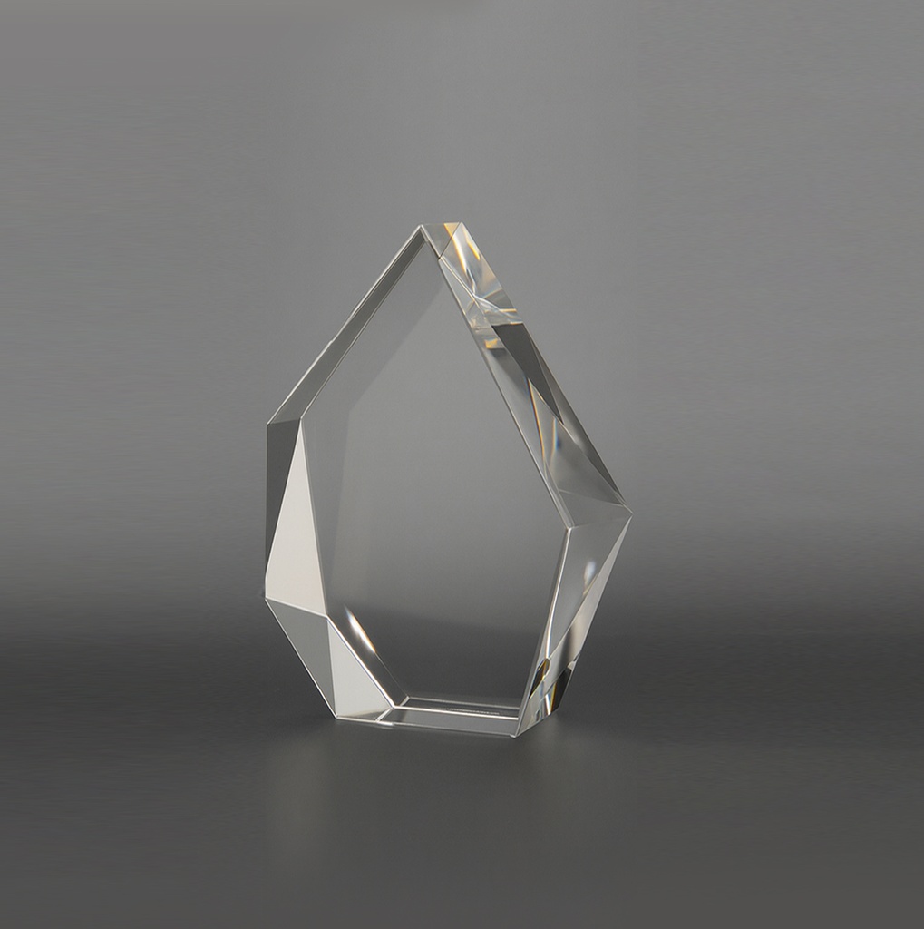 Quintris is Pentagonal shaped Crystal is enhancing a piece that blends modern design with elegance. Its unique five-sided shape creates depth from every angle, making it a sophisticated focal point in any space.